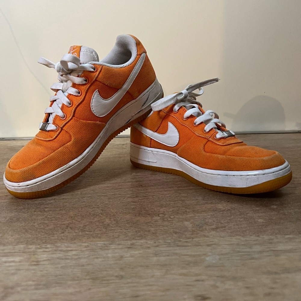 Nike Air Force Ones orange canvas low top shoe